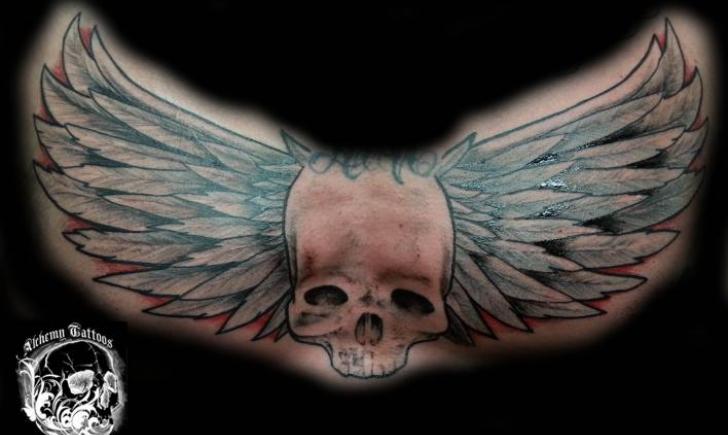 Skull Tattoo by Alchemy Tattoos and Body Piercing Skull Tattoo Designs